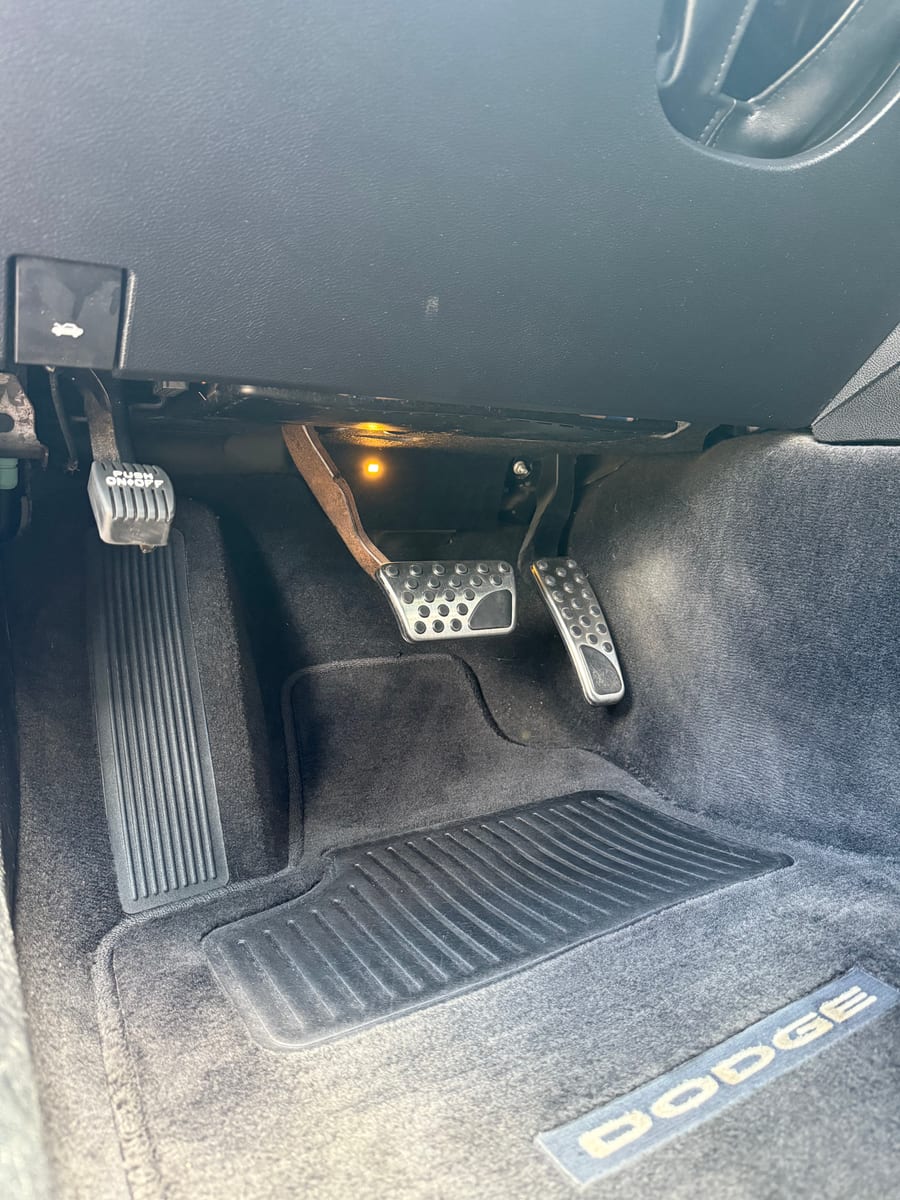 Dodge Charger R/T Driver floor after detailing by A&F Auto Detailing