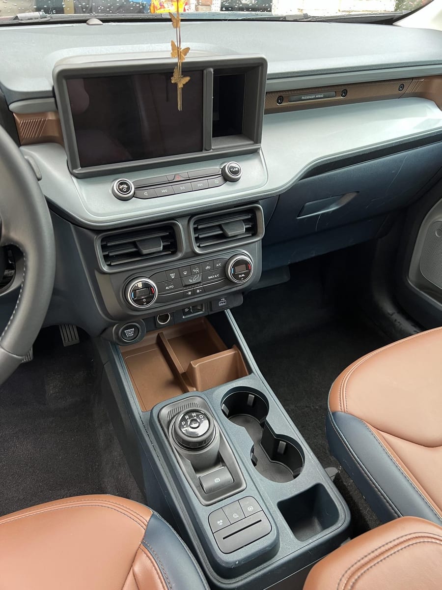 Ford Maverick Center console after detailing by A&F Auto Detailing