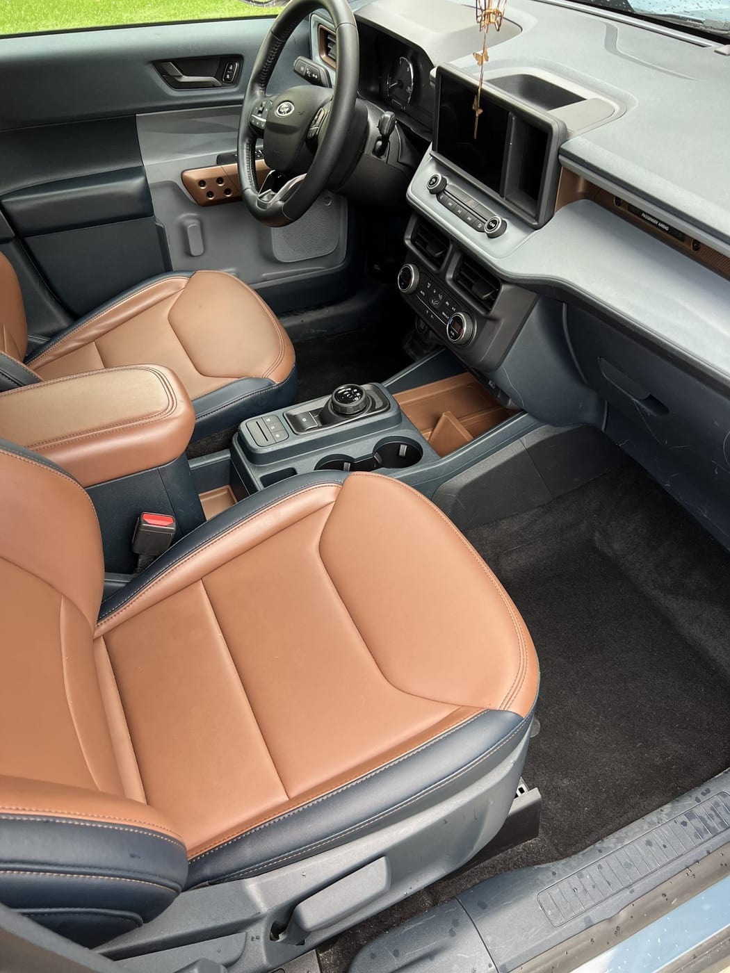 Ford Maverick cognac leather interior after a detail by A&F Auto Detailing