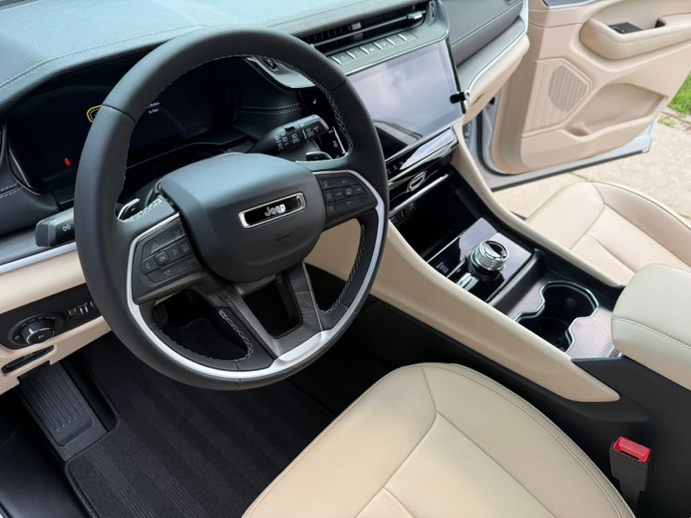 Detailed Jeep cockpit — wheel, dash and console